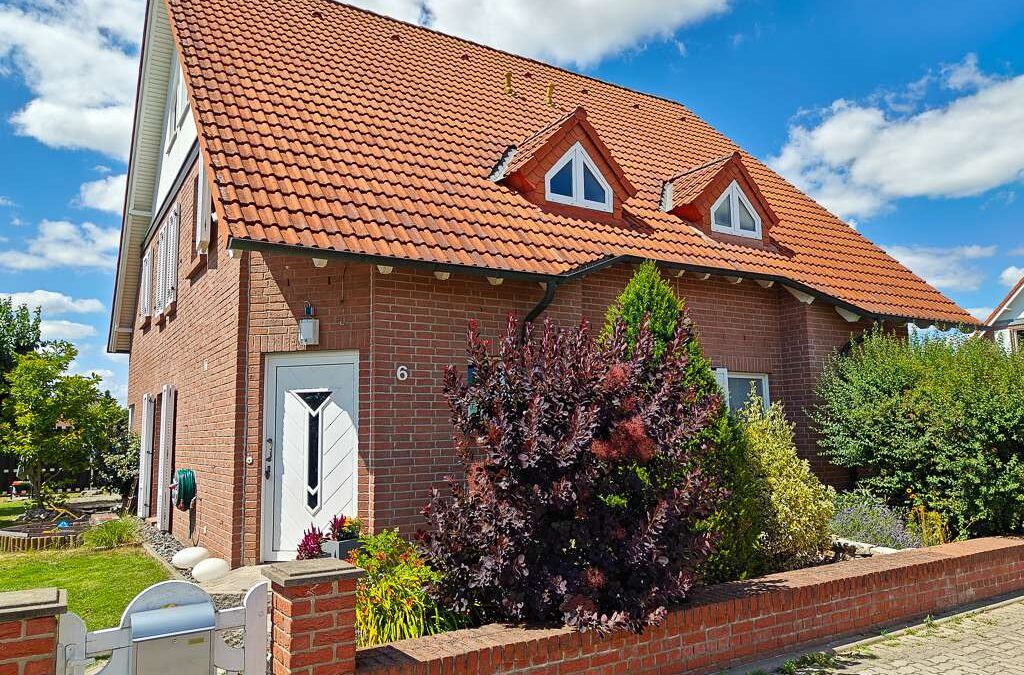 Doppelhaushälfte mit 5 Zimmern, Kamin und Garten in Wellen mit Energieeffizienzklasse C